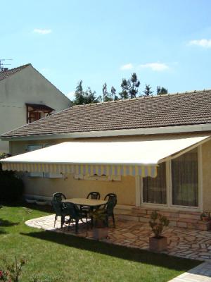 Store Banne jaune et blanc pour terrasse ou balcon