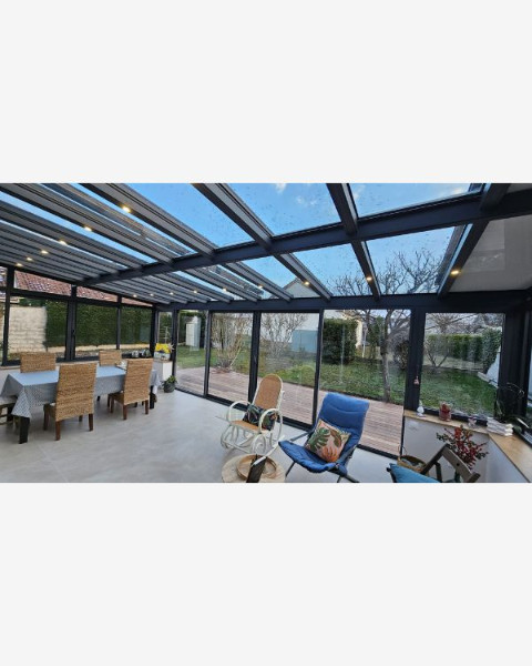 Véranda Moderne en Aluminium pour la création d'une nouvelle pièce de vie